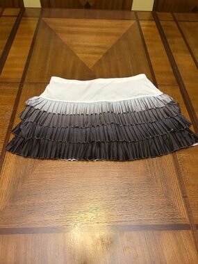 Lucky in Love Women’s Pleated Tiered Athletic Mini Skirt in White and Black